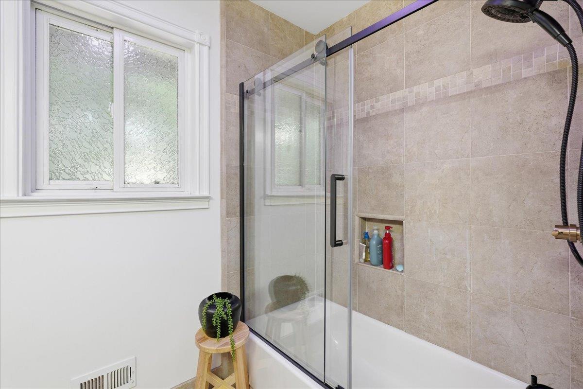 4849 Alexon Way Carmichael, CA 95608 - Photo 31 of 50 a bathroom with a bathtub and a shower