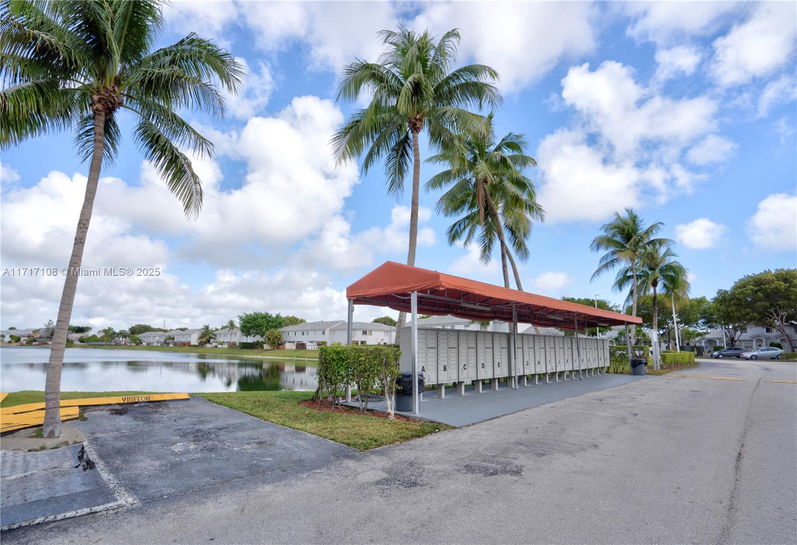 12124 Southwest 143rd Lane, Unit 85 Miami, FL 33186 - Photo 20 of 44 a view of a park with palm trees