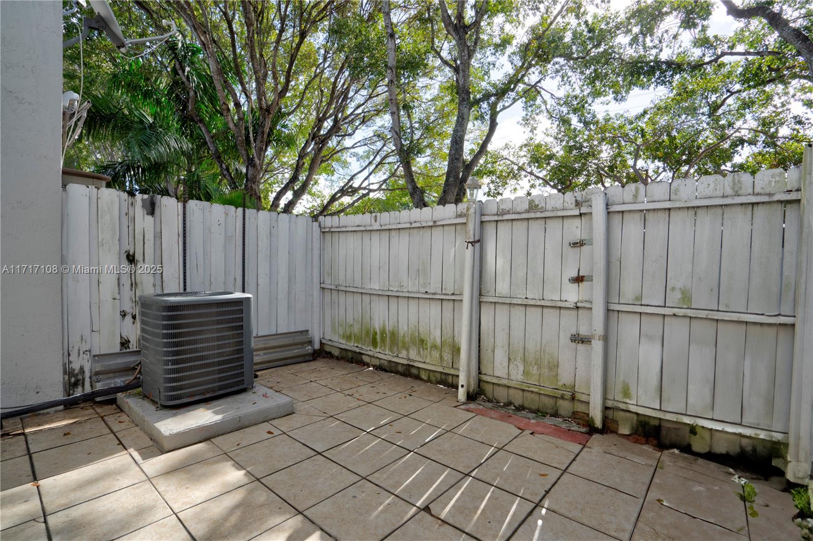 12124 Southwest 143rd Lane, Unit 85 Miami, FL 33186 - Photo 34 of 44 a view of a backyard