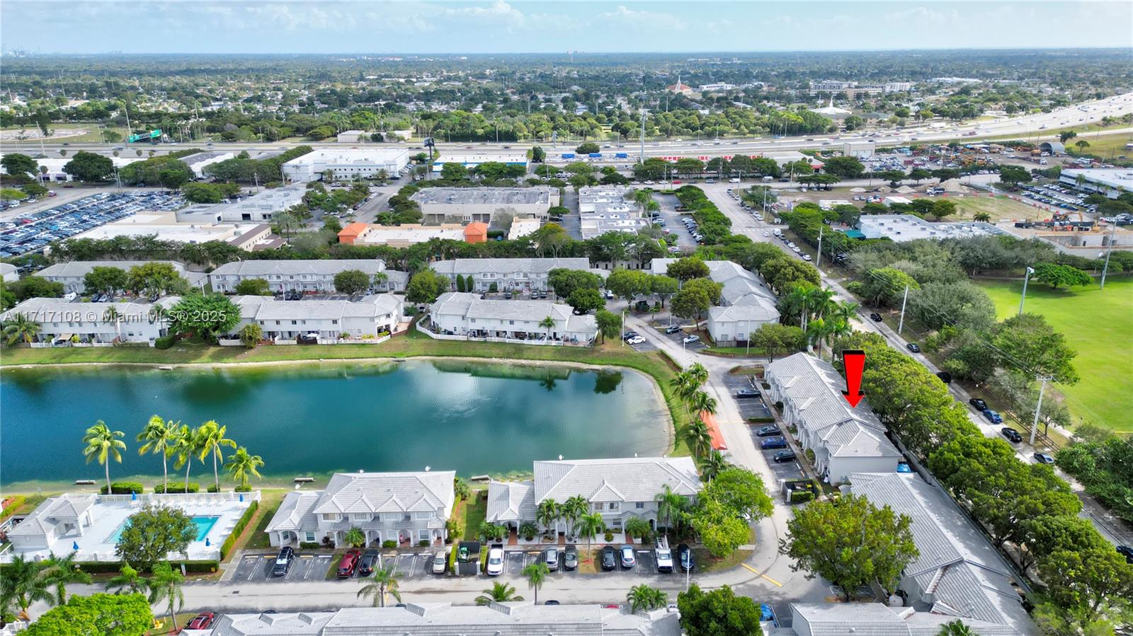12124 Southwest 143rd Lane, Unit 85 Miami, FL 33186 - Photo 6 of 44 an aerial view of residential houses with outdoor space and lake view