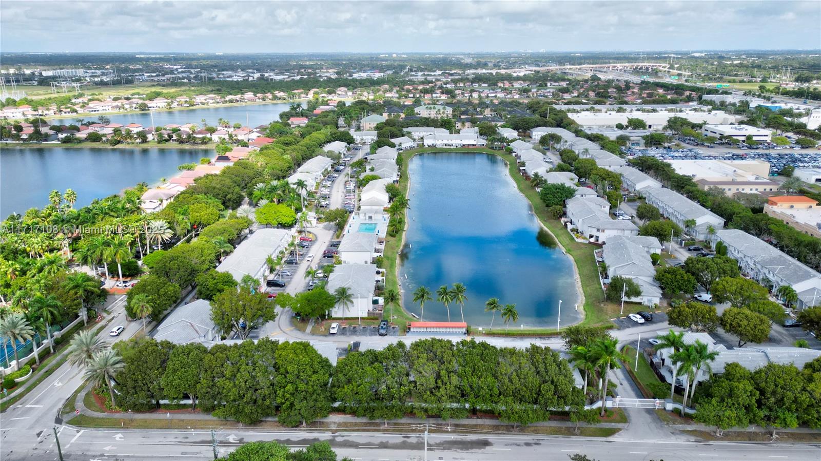 12124 Southwest 143rd Lane, Unit 85 Miami, FL 33186 - Photo 8 of 44 an aerial view of a house with a lake view