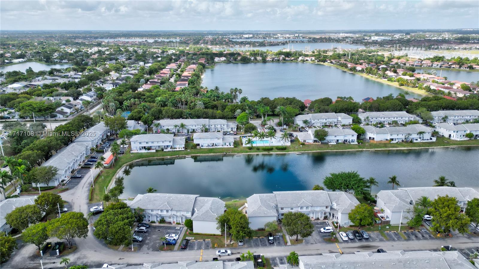 12124 Southwest 143rd Lane, Unit 85 Miami, FL 33186 - Photo 10 of 44 an aerial view of ocean and residential houses with outdoor space and ocean view
