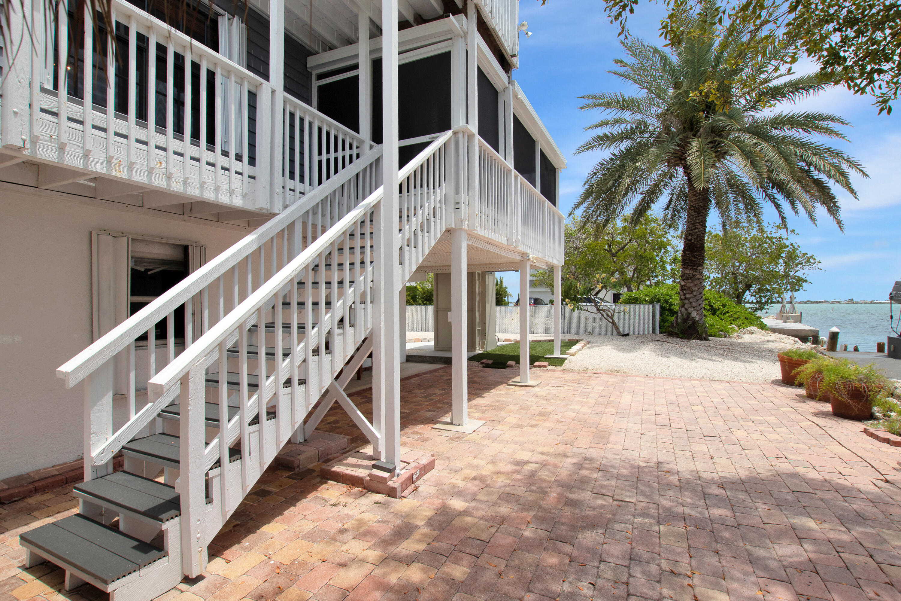 28594 Tortuga Road Summerland Key, FL 33042 - Photo 8 of 46 Back yard, staircase entry