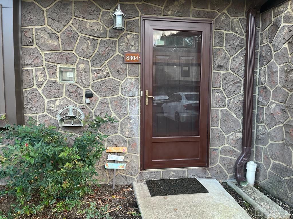 8304 Hana Road Edison, NJ 08817 - Photo 1 of 12 a view of a door and a window