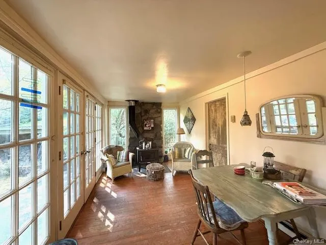 a view of a dining room with furniture window and outside view