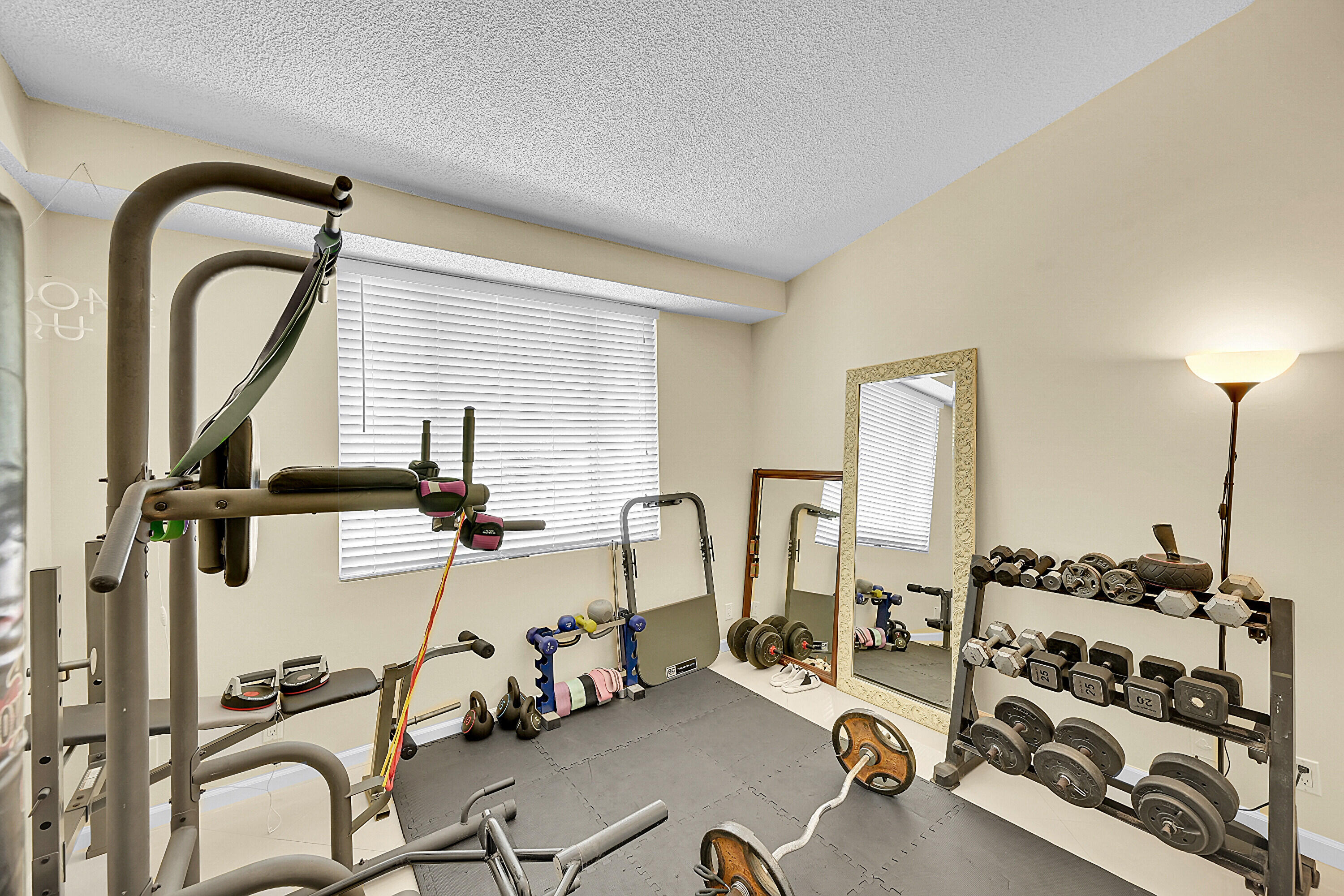 931 Lyons Road, Unit 4201 Coconut Creek, FL 33063 - Photo 16 of 47 a view of a room with gym equipment