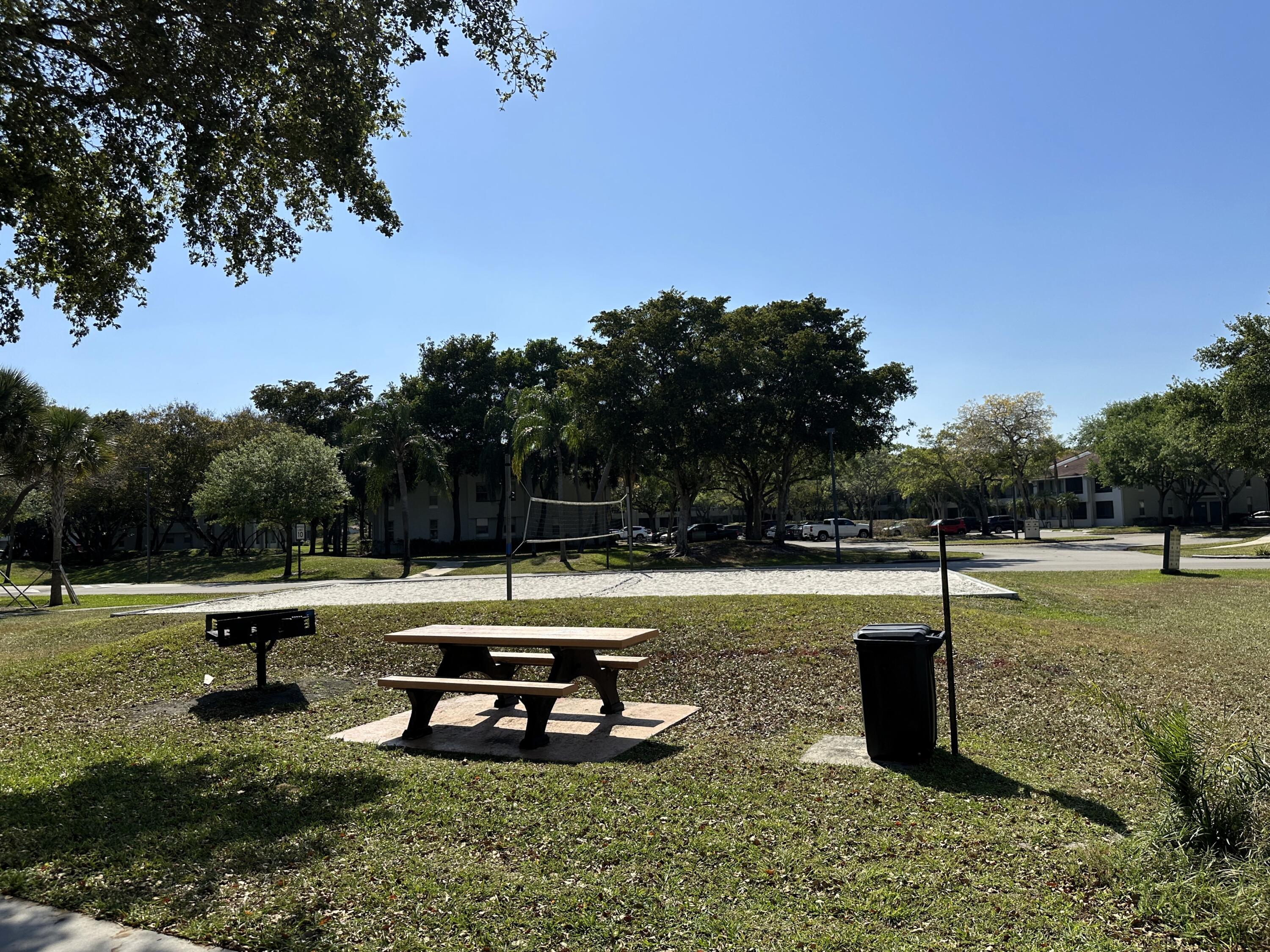 931 Lyons Road, Unit 4201 Coconut Creek, FL 33063 - Photo 37 of 47 a view of a park with slide