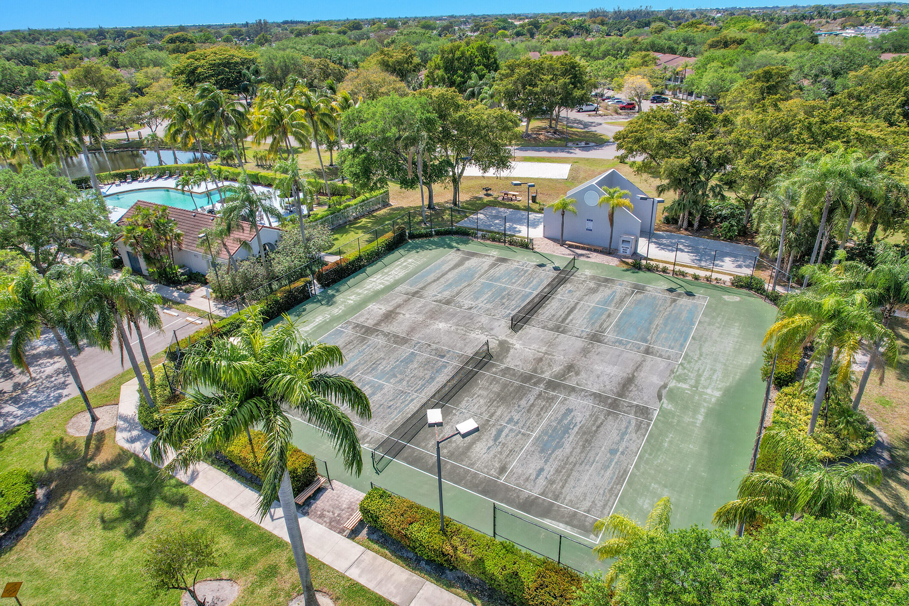 931 Lyons Road, Unit 4201 Coconut Creek, FL 33063 - Photo 38 of 47 a view of a yard with plants