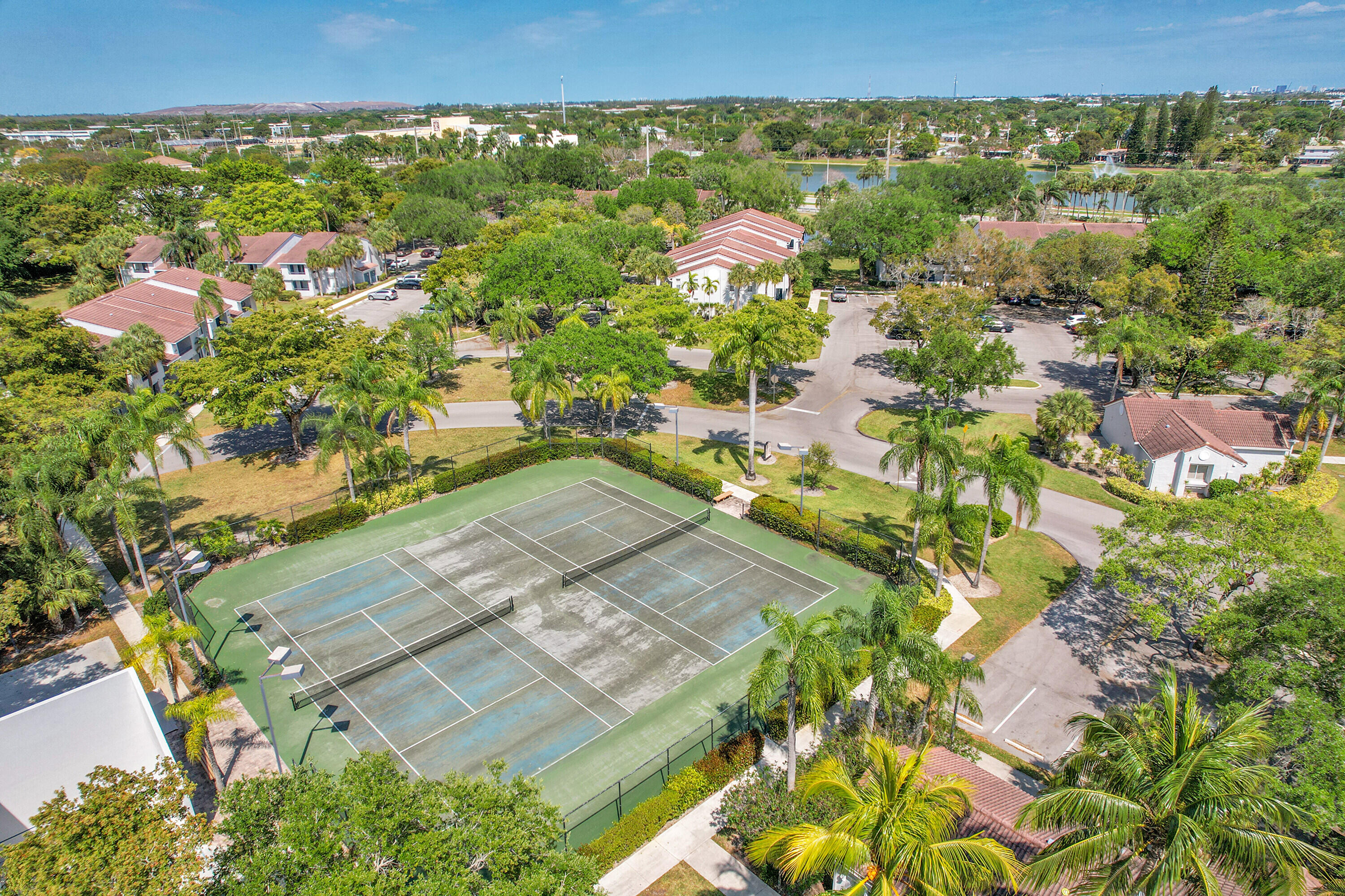 931 Lyons Road, Unit 4201 Coconut Creek, FL 33063 - Photo 39 of 47 an aerial view of residential houses with outdoor space