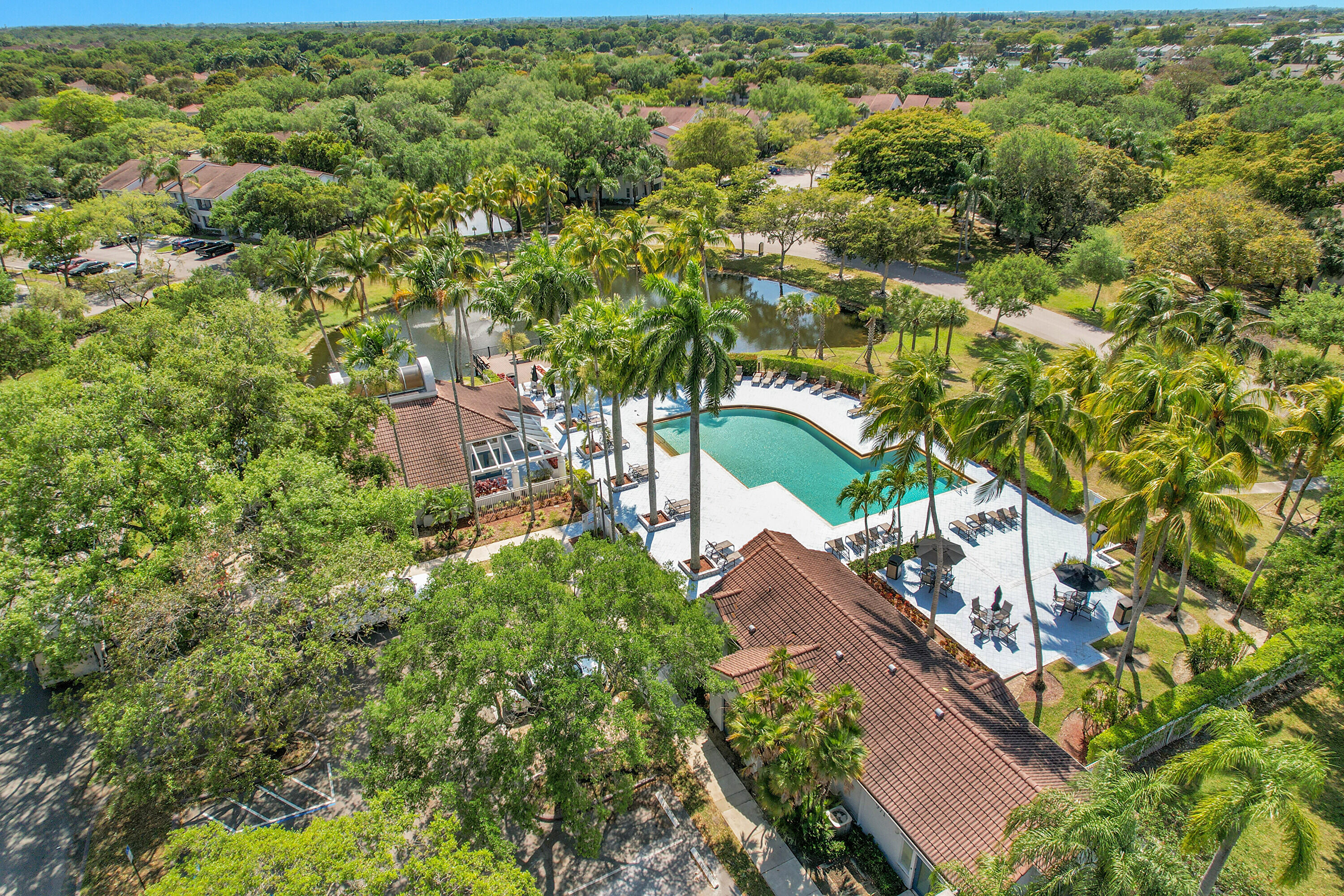 931 Lyons Road, Unit 4201 Coconut Creek, FL 33063 - Photo 40 of 47 an aerial view of residential houses with outdoor space