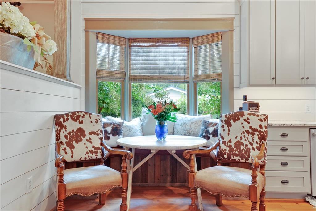745 Washington Street Clarkesville, GA 30523 - Photo 13 of 54 a living room with furniture and large windows