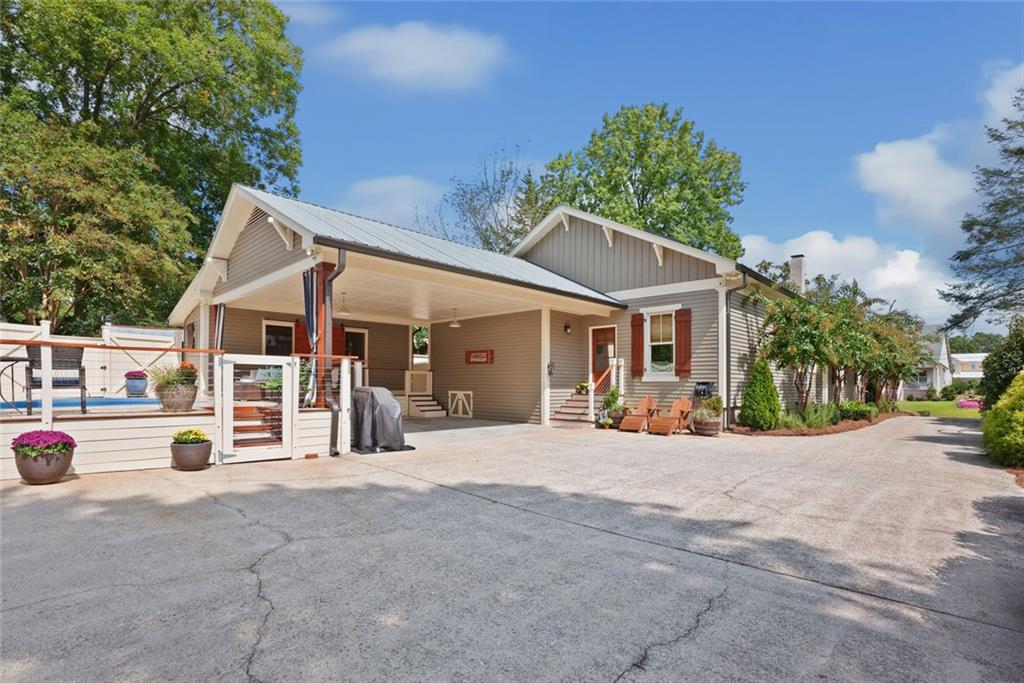 745 Washington Street Clarkesville, GA 30523 - Photo 42 of 54 a view of a house with a patio
