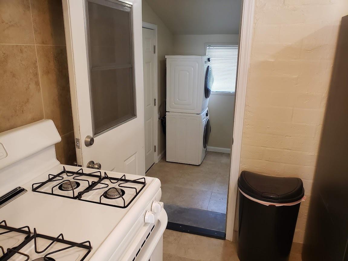 335 Oxford Avenue Clovis, CA 93612 - Photo 16 of 28 Front House Kitchen leading out to the laundry room