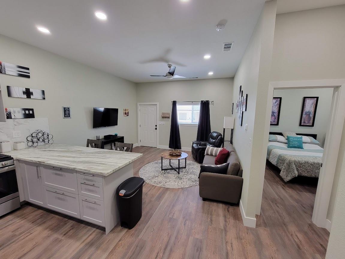 335 Oxford Avenue Clovis, CA 93612 - Photo 28 of 28 ADU Living room. Open floor Plan and looking into the bedroom