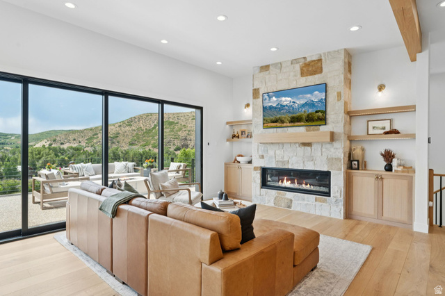 1400 Weber Wild Road Oakley, UT 84055 - Photo 15 of 55 Open-concept living area with wood-finish flooring