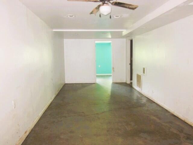 5574 Providence Church Road Ferrum, VA 24088 - Photo 13 of 17 an empty room with a ceiling fan and carpet