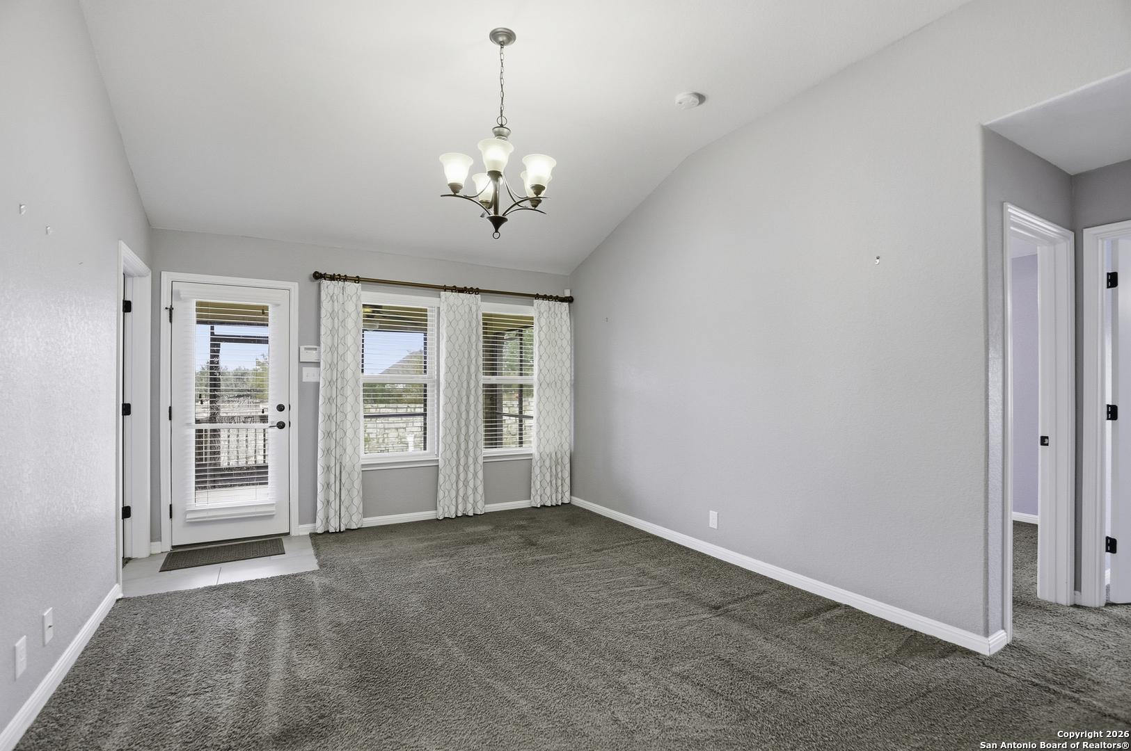 829 Laserra Cibolo, TX 78108 - Photo 6 of 15 a view of an empty room with a window