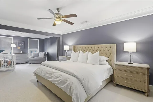 a bedroom with bed and window