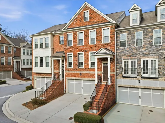 a front view of a house with a outdoor view