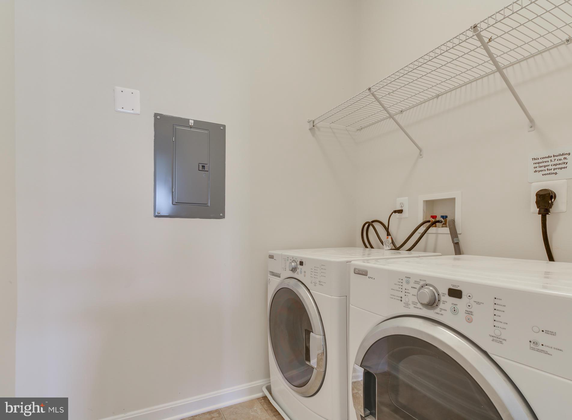 7305 Maplecrest Road, Unit 208 Elkridge, MD 21075 - Photo 23 of 30 a utility room with dryer and washer