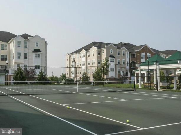 7305 Maplecrest Road, Unit 208 Elkridge, MD 21075 - Photo 30 of 30 a view of a tall building next to a road