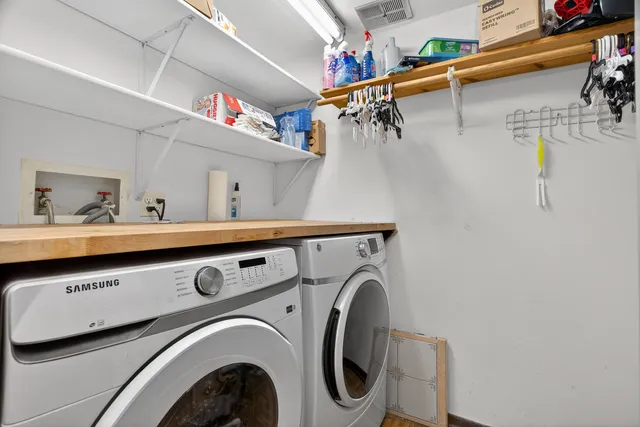 a utility room with dryer and washer
