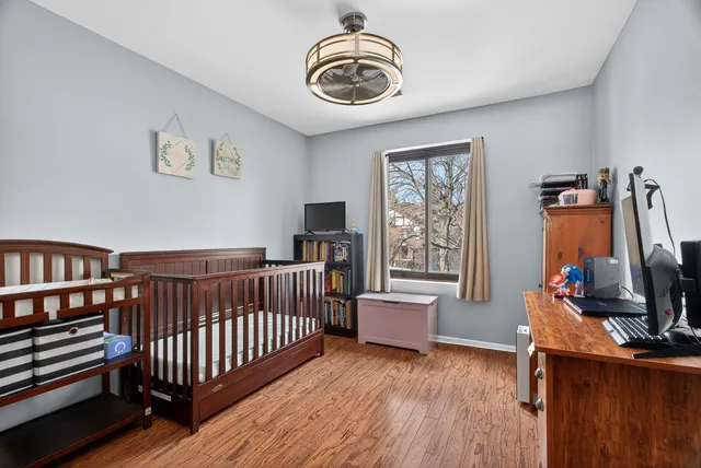 a bedroom with furniture and a window