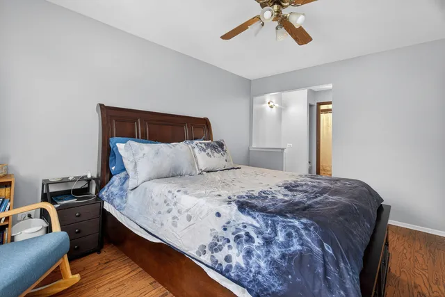 a bedroom with bed and window