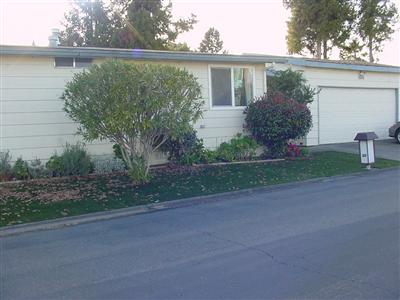 1945 Piner Road, Unit 128 Santa Rosa, CA 95403 - Photo 6 of 10 a view of a house with a yard