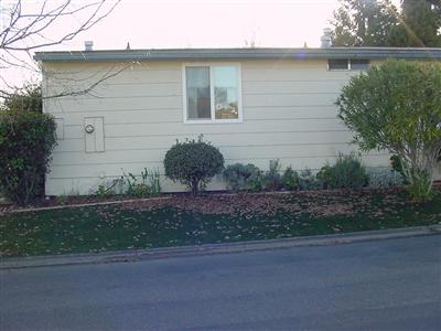 1945 Piner Road, Unit 128 Santa Rosa, CA 95403 - Photo 7 of 10 a front view of a house with garden