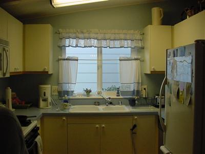 1945 Piner Road, Unit 128 Santa Rosa, CA 95403 - Photo 8 of 10 a bathroom with a sink and a mirror
