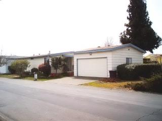 1945 Piner Road, Unit 128 Santa Rosa, CA 95403 - Photo 10 of 10 a view of a house with a yard and sitting area