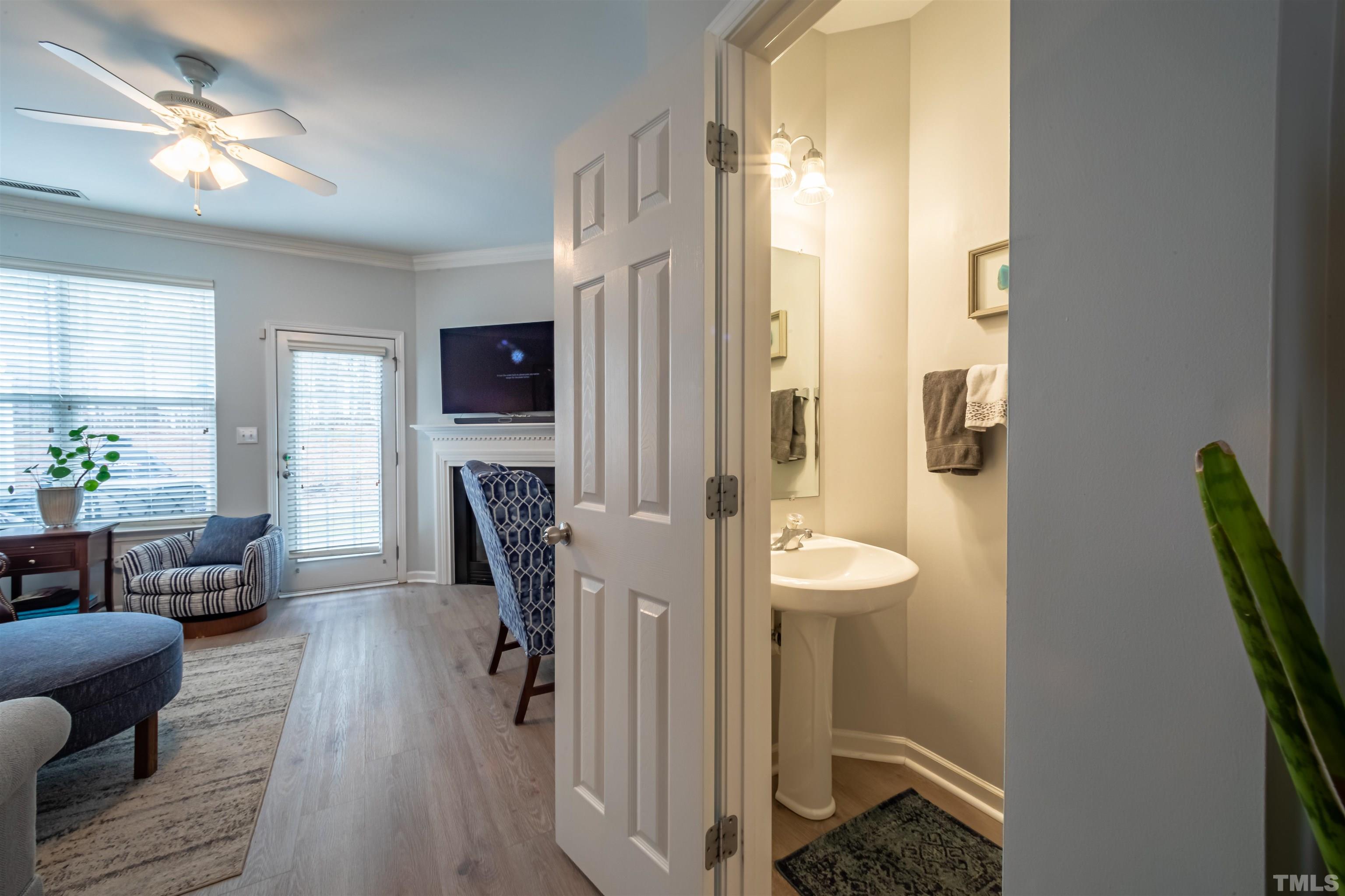 8447 Central Drive Raleigh, NC 27613 - Photo 8 of 19 a view of living room with furniture and a window