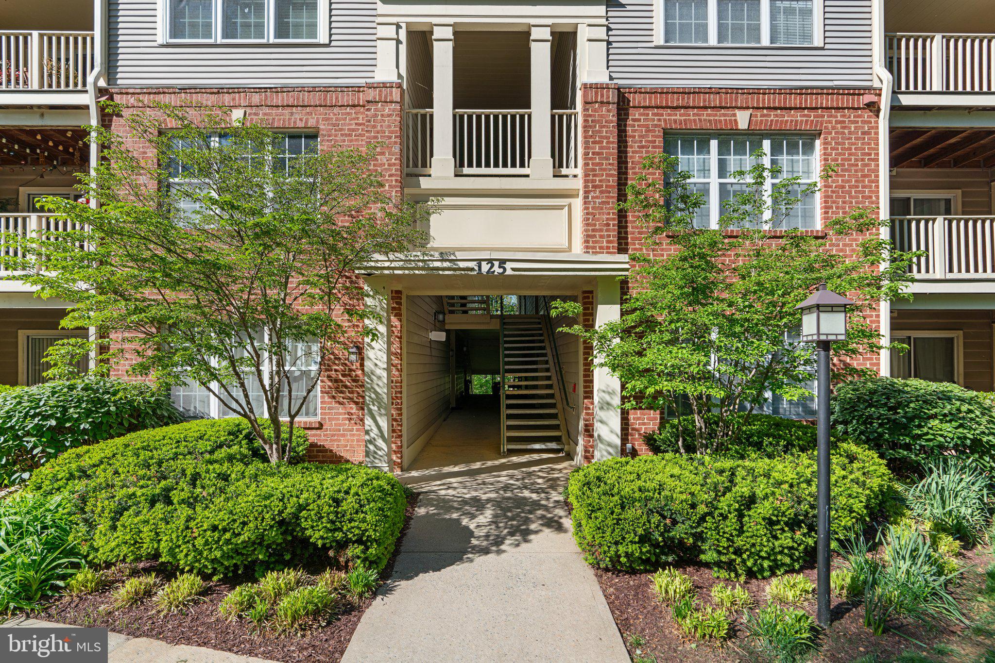 125 Timberbrook Lane, Unit T2 Gaithersburg, MD 20878 - Photo 2 of 30 front view of a house
