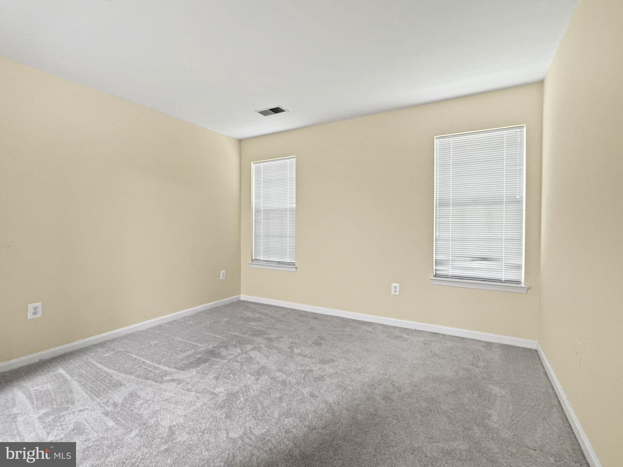 125 Timberbrook Lane, Unit T2 Gaithersburg, MD 20878 - Photo 23 of 30 a view of an empty room with a window