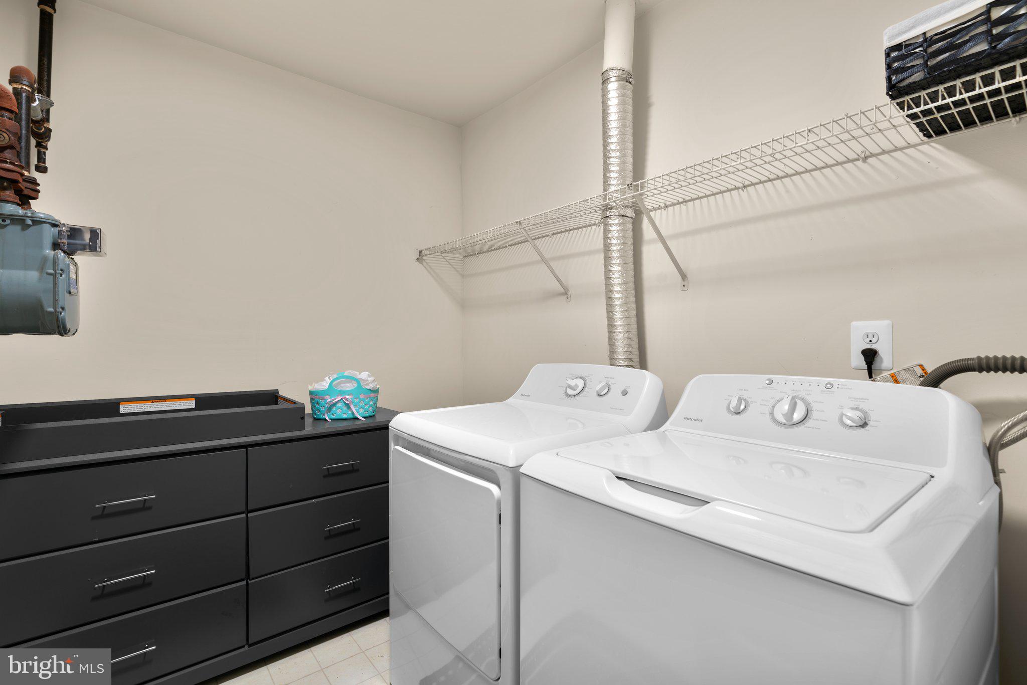 125 Timberbrook Lane, Unit T2 Gaithersburg, MD 20878 - Photo 28 of 30 a utility room with dryer and washer