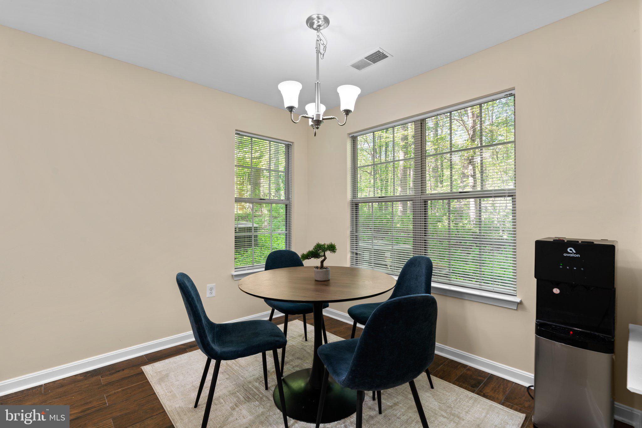 125 Timberbrook Lane, Unit T2 Gaithersburg, MD 20878 - Photo 10 of 30 a dining room with furniture and window