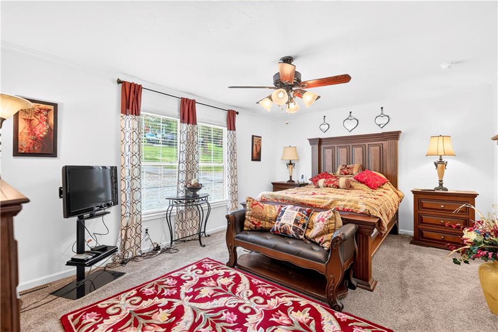 100 Linden Monongahela, PA 15063 - Photo 19 of 41 Massive 17x13 Primary Bedroom w/ Beautiful Carpeting, En Suite Full Bathroom & HUGE 7x6 Walk-in Closet!
