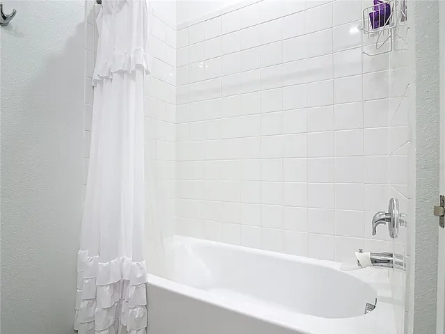 a bathroom with a bathtub