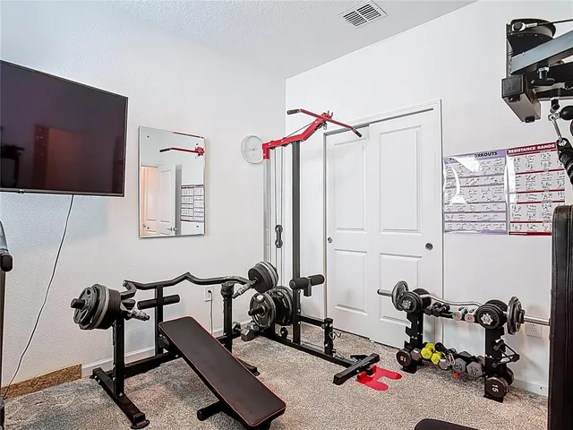 a view of a room with gym equipment
