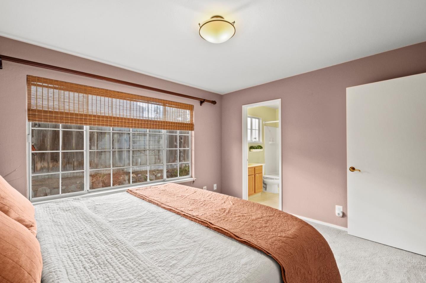 4 Primrose Circle Seaside, CA 93955 - Photo 13 of 22 a bedroom with a bed and window