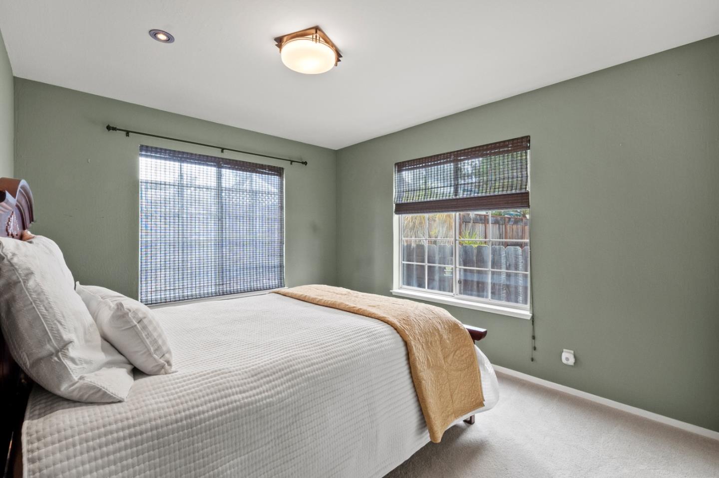 4 Primrose Circle Seaside, CA 93955 - Photo 14 of 22 a bedroom with a bed and a window