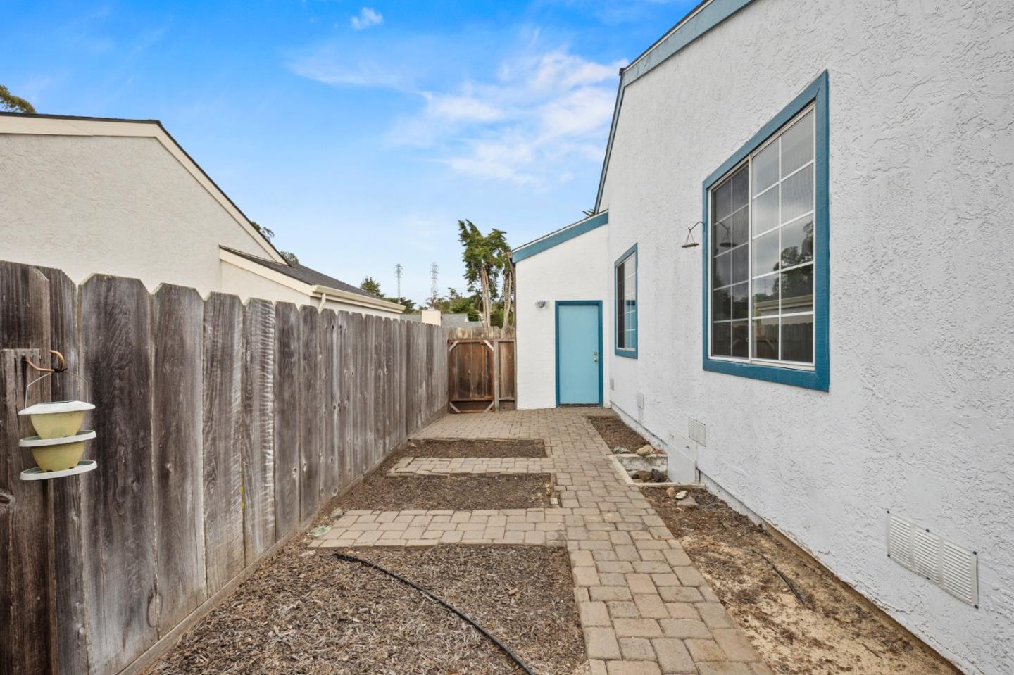 4 Primrose Circle Seaside, CA 93955 - Photo 21 of 22 a view of a house with a backyard