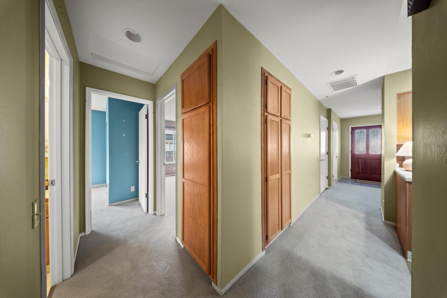 4 Primrose Circle Seaside, CA 93955 - Photo 10 of 22 a view of a hallway with wooden shelves