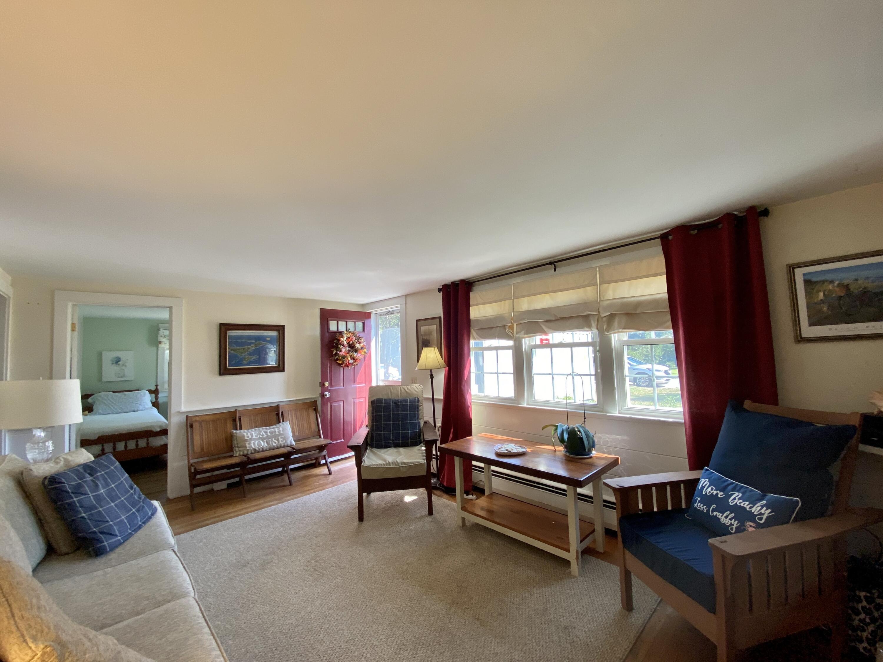 23 Naushon Road Dennis Port, MA 02639 - Photo 16 of 31 a living room with furniture and a window