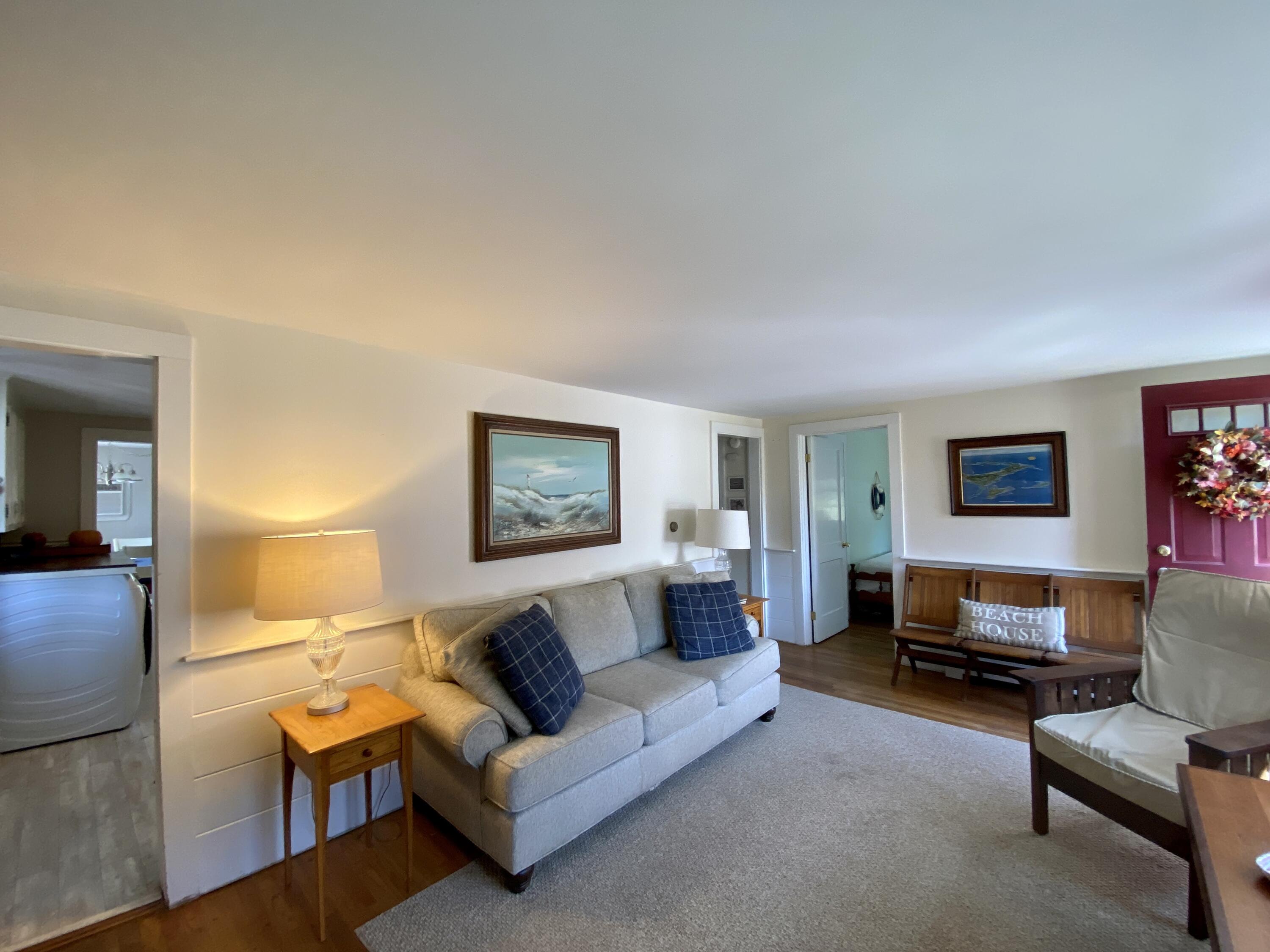 23 Naushon Road Dennis Port, MA 02639 - Photo 18 of 31 a bedroom with furniture and a couch