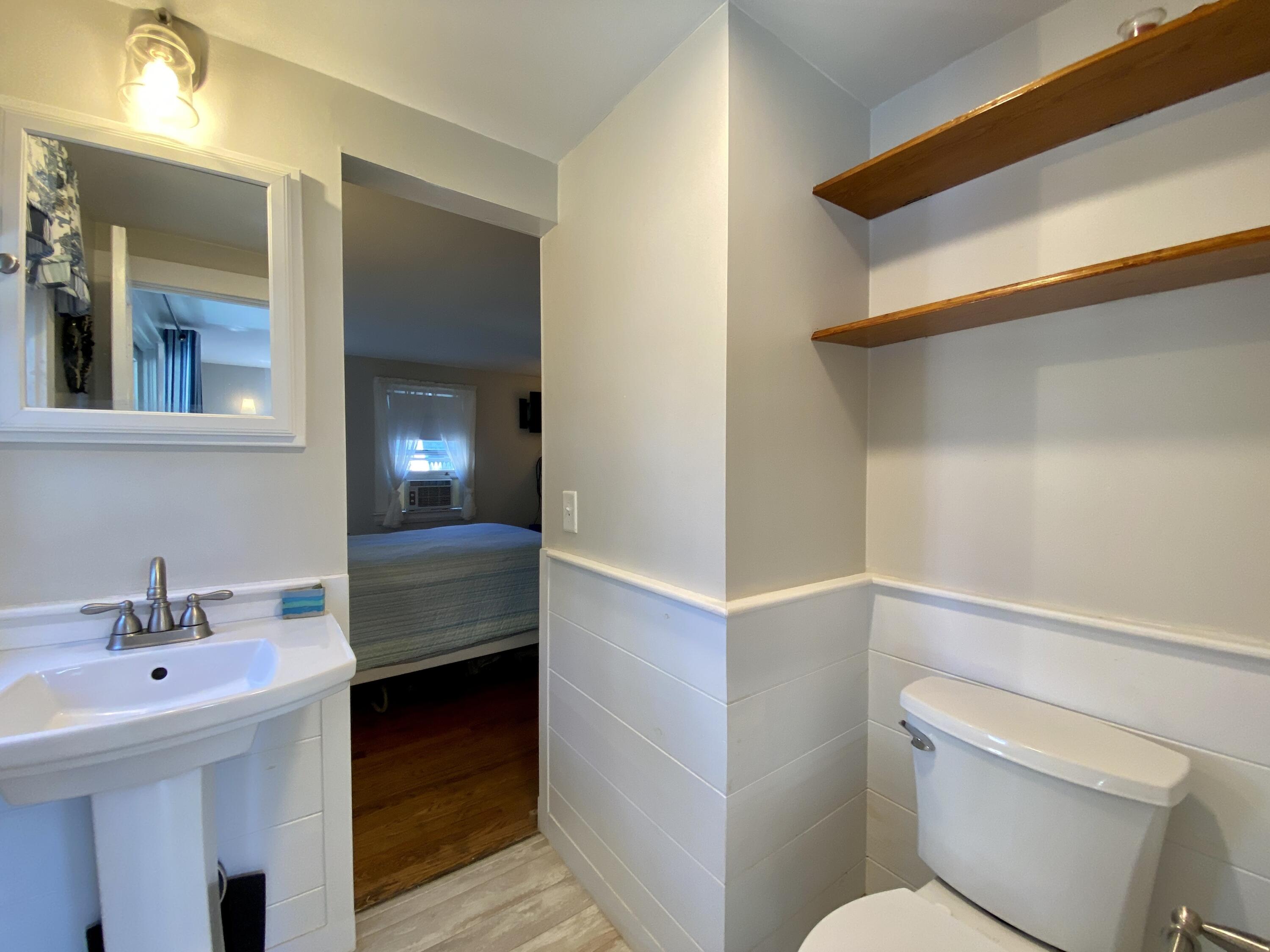 23 Naushon Road Dennis Port, MA 02639 - Photo 21 of 31 a bathroom with a sink and mirror