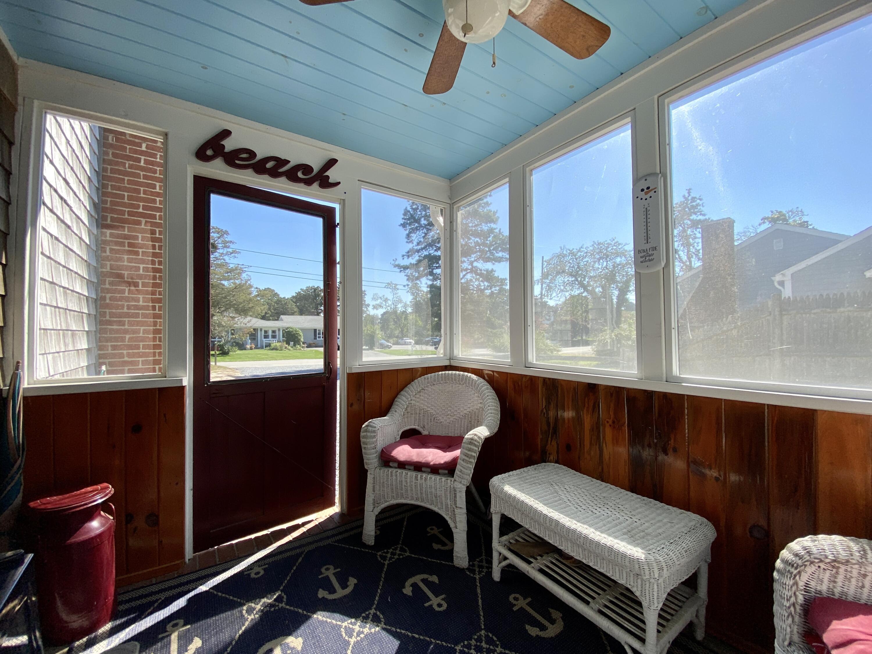 23 Naushon Road Dennis Port, MA 02639 - Photo 5 of 31 a room with furniture and a window