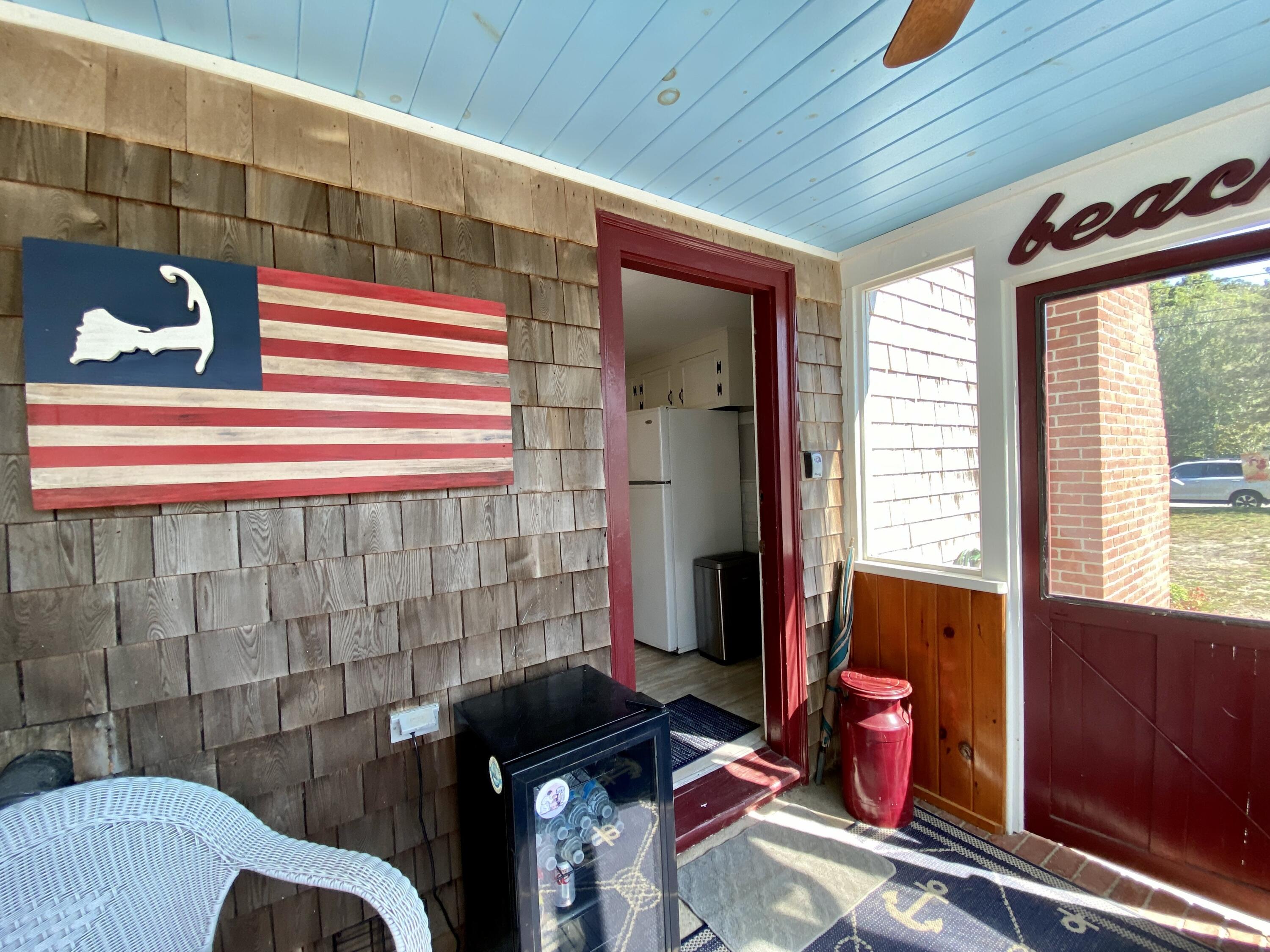23 Naushon Road Dennis Port, MA 02639 - Photo 6 of 31 a bathroom with a sink and a mirror
