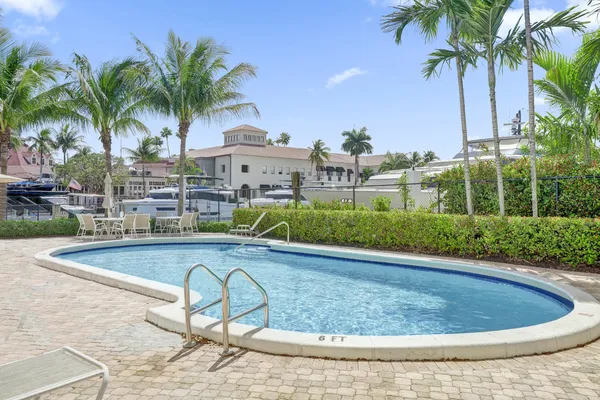 a view of a swimming pool with a garden
